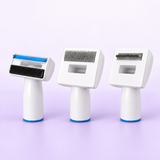 Three white grooming attachments with blue trim