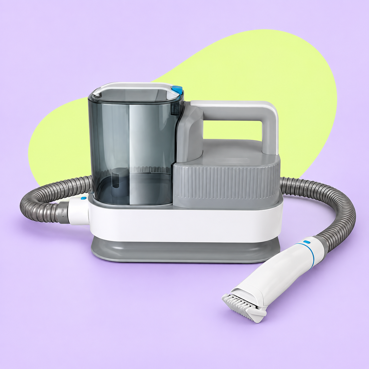 White and grey grooming vacuum with collection bin, hose and grooming handpiece
